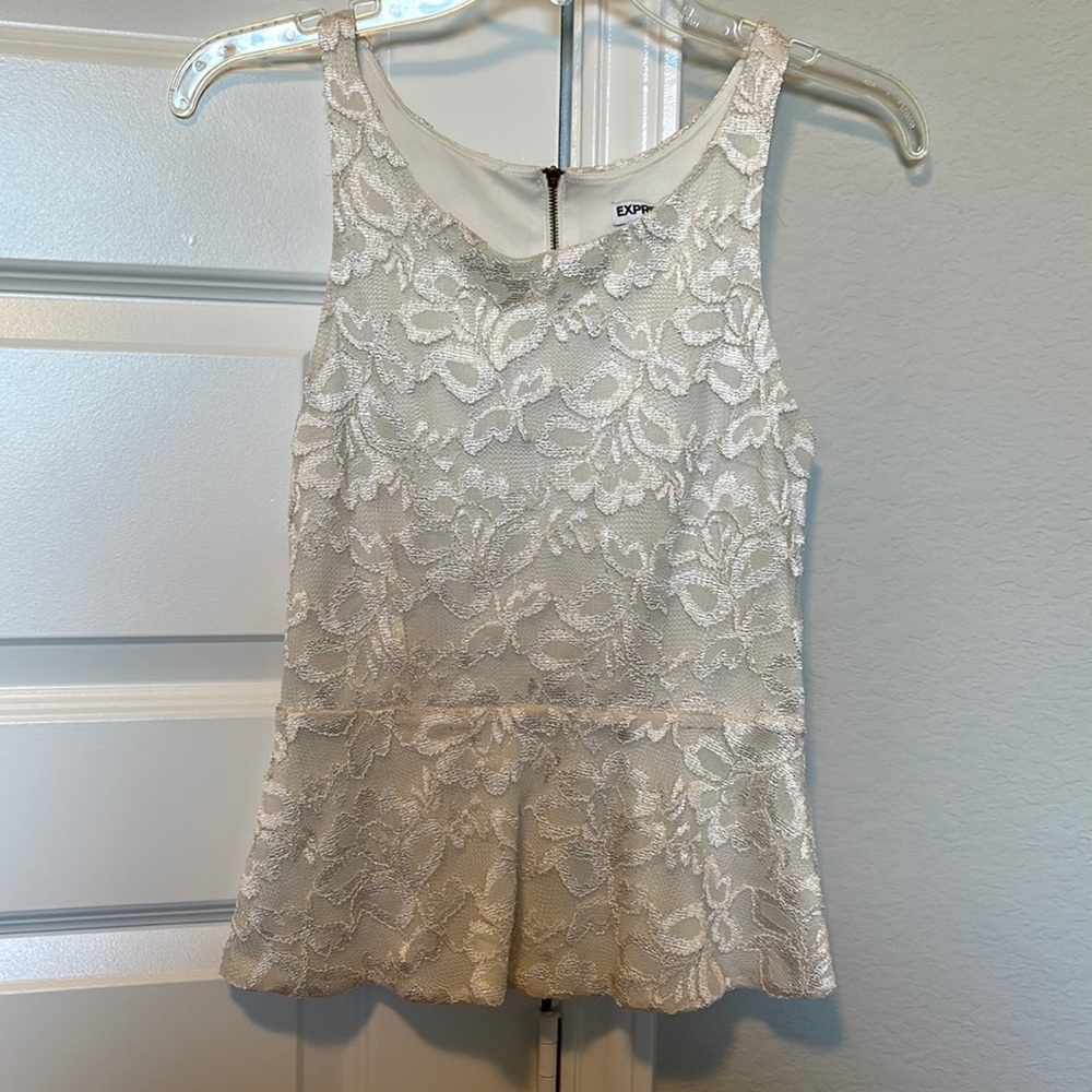 Off-white lace style peplum top from Express size XS